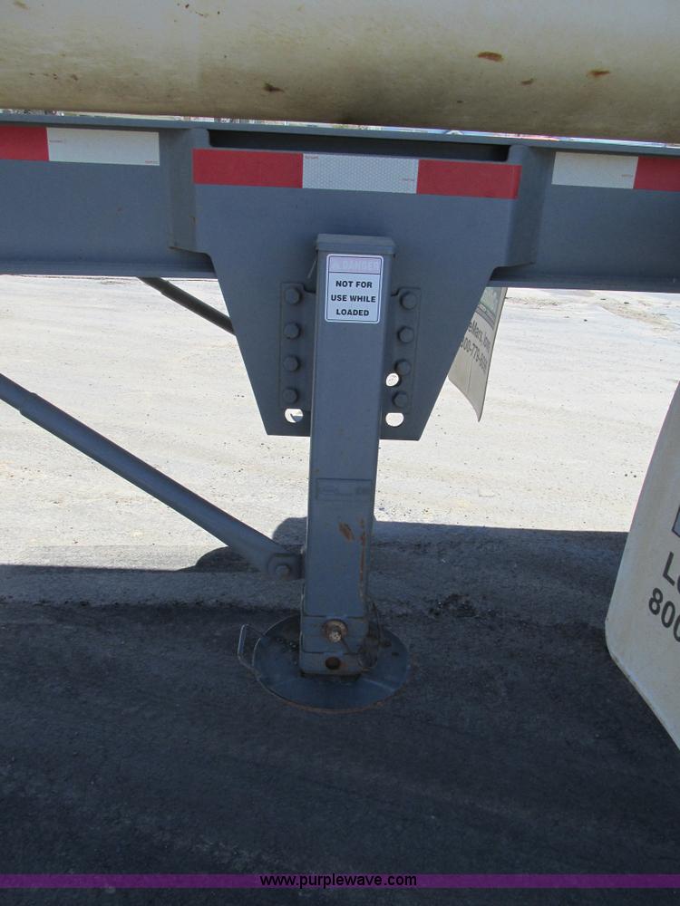 image for item K5005 2002 Smith side dump trailer