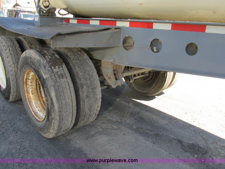 image for item K5005 2002 Smith side dump trailer