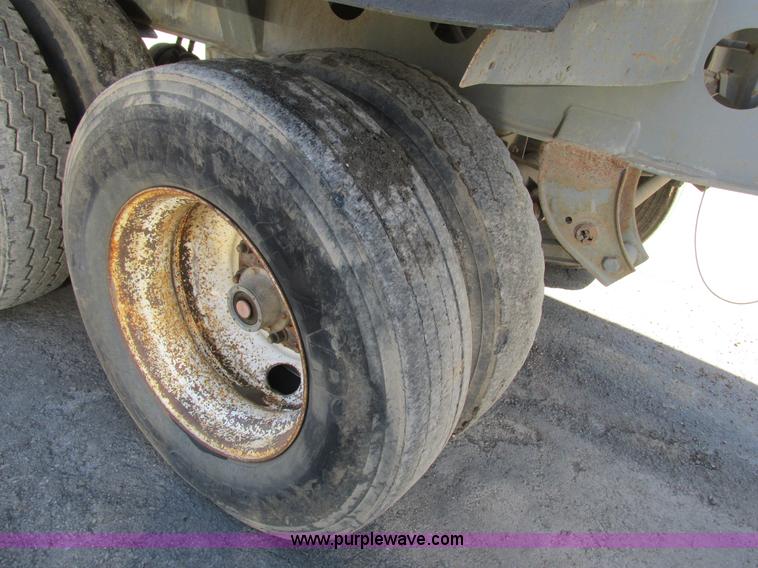 image for item K5005 2002 Smith side dump trailer