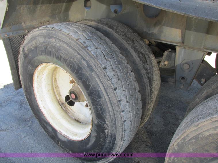 image for item K5005 2002 Smith side dump trailer