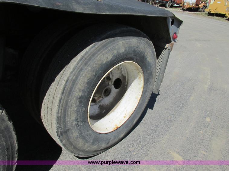 image for item K5005 2002 Smith side dump trailer