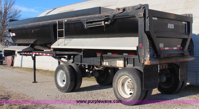 image for item K8769 2002 Travis barrel bed end dump trailer