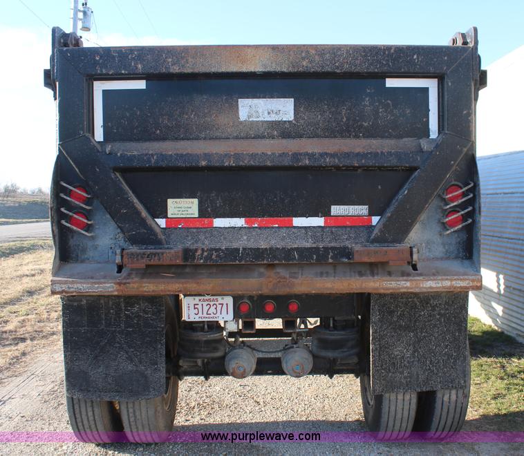 image for item K8769 2002 Travis barrel bed end dump trailer