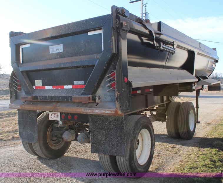 image for item K8769 2002 Travis barrel bed end dump trailer