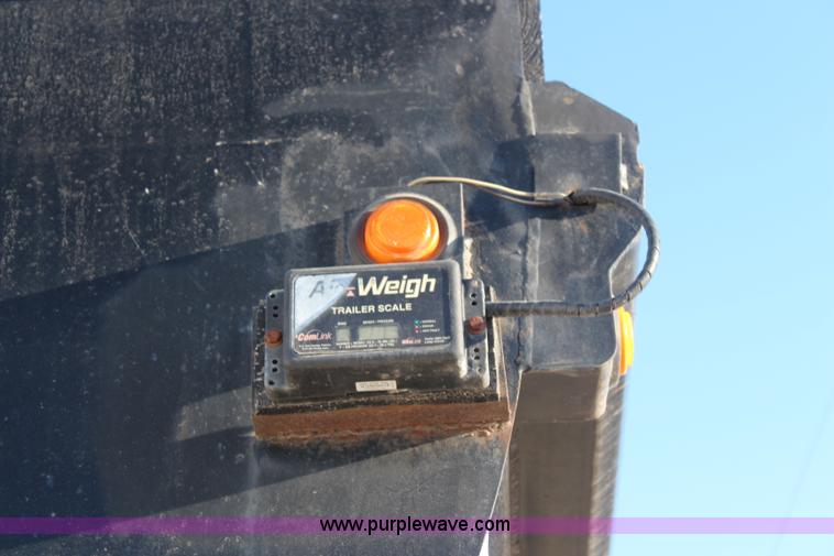 image for item K8769 2002 Travis barrel bed end dump trailer