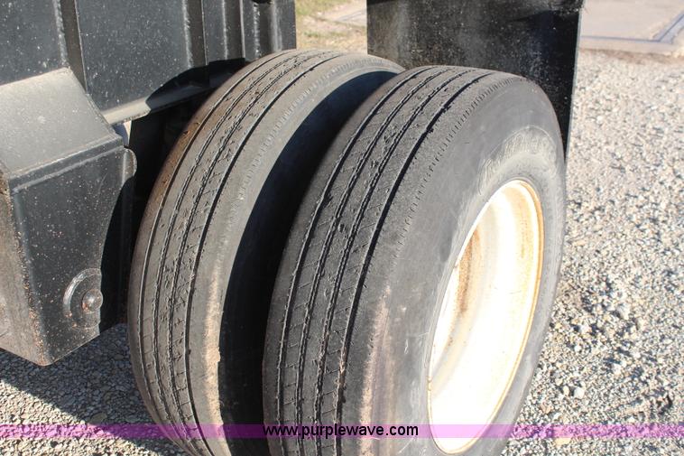 image for item K8769 2002 Travis barrel bed end dump trailer