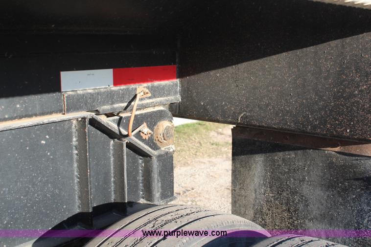 image for item K8769 2002 Travis barrel bed end dump trailer