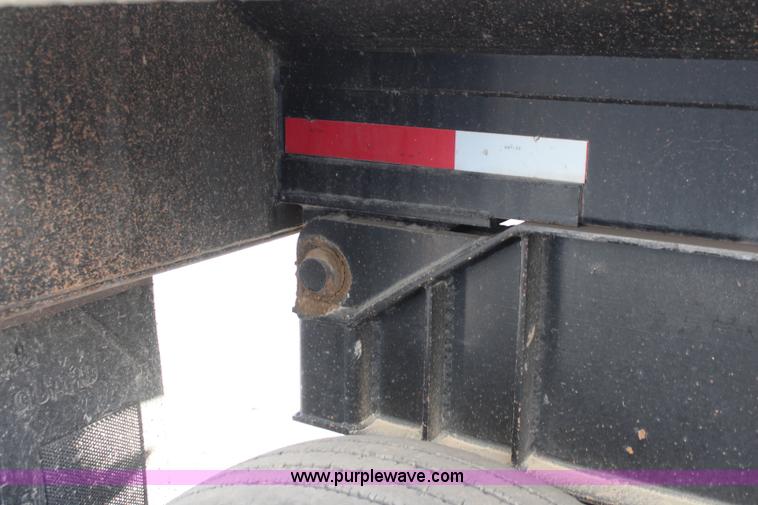 image for item K8769 2002 Travis barrel bed end dump trailer