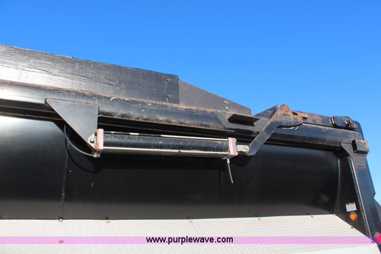 image for item K8769 2002 Travis barrel bed end dump trailer