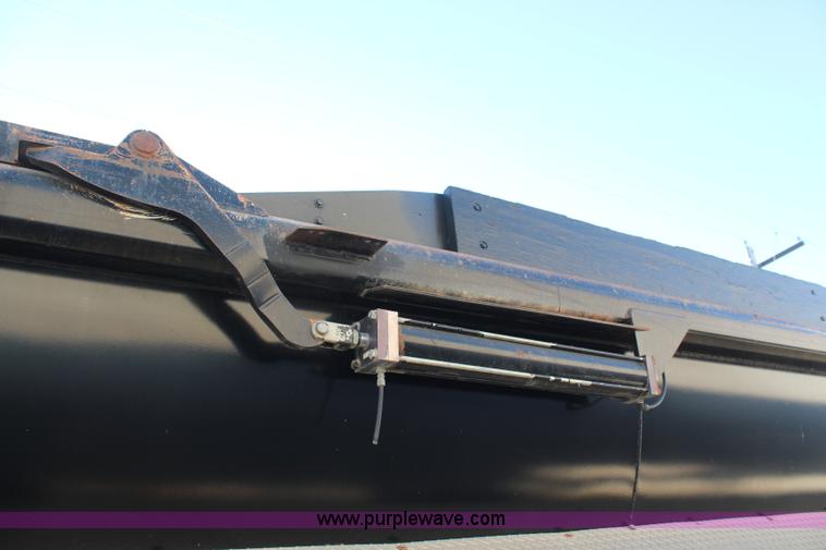 image for item K8769 2002 Travis barrel bed end dump trailer
