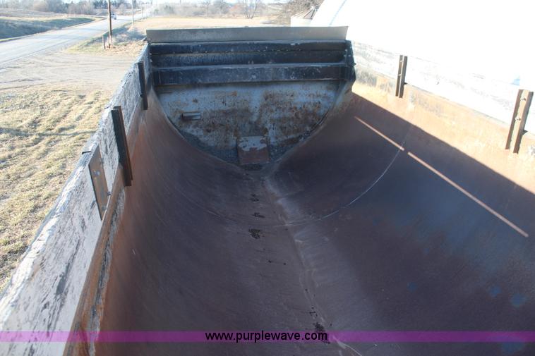 image for item K8769 2002 Travis barrel bed end dump trailer