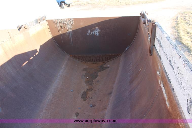 image for item K8769 2002 Travis barrel bed end dump trailer