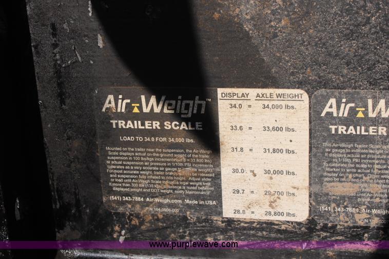 image for item K8769 2002 Travis barrel bed end dump trailer