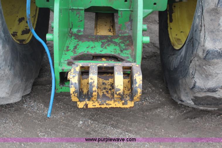 image for item K8931 2002 John Deere 9520 4WD tractor