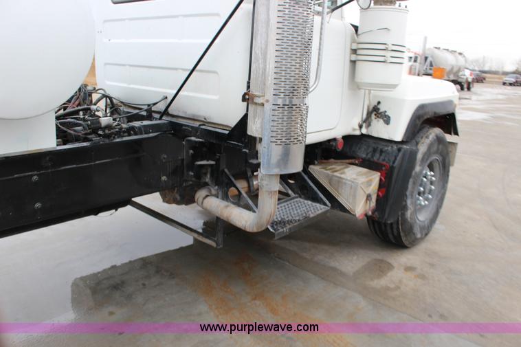 image for item L6704 1999 Mack RD69S mixer truck