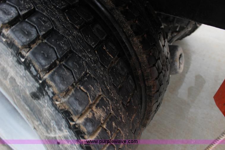 image for item L6704 1999 Mack RD69S mixer truck