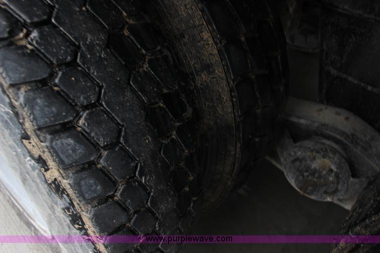 image for item L6704 1999 Mack RD69S mixer truck