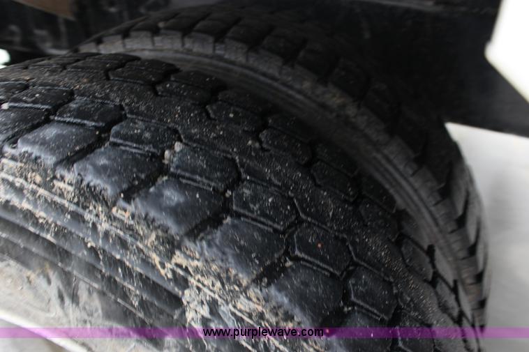 image for item L6704 1999 Mack RD69S mixer truck