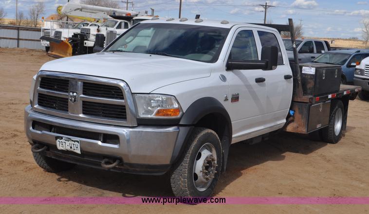image for item F2364 2011 Dodge Ram 5500 HD Quad Cab flatbed truck