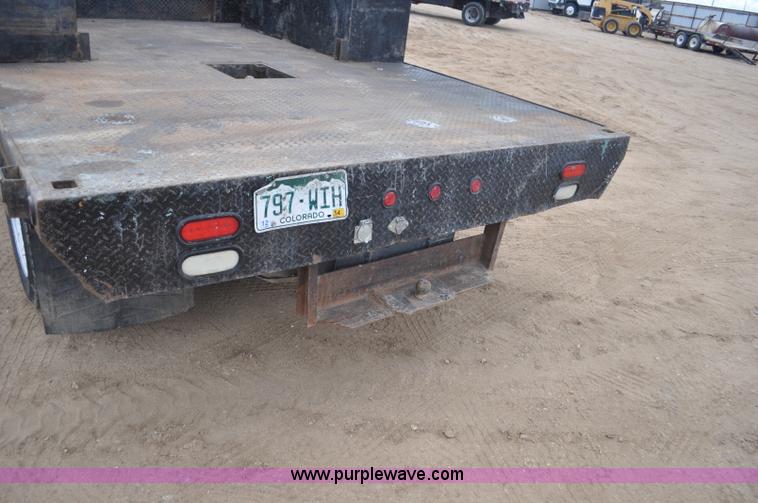 image for item F2364 2011 Dodge Ram 5500 HD Quad Cab flatbed truck