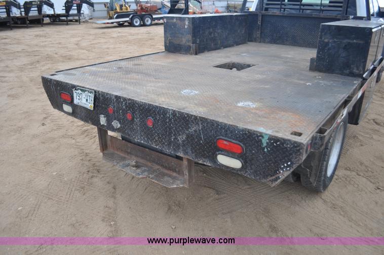 image for item F2364 2011 Dodge Ram 5500 HD Quad Cab flatbed truck