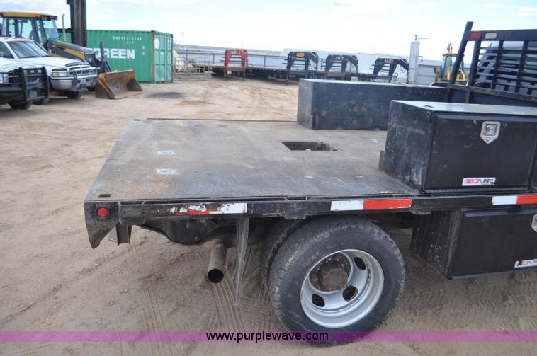 image for item F2364 2011 Dodge Ram 5500 HD Quad Cab flatbed truck