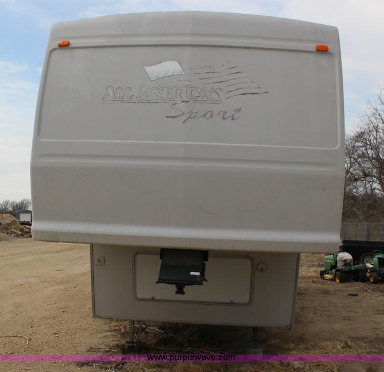image for item F7633 2005 All American Sport fifth wheel toy hauler camper