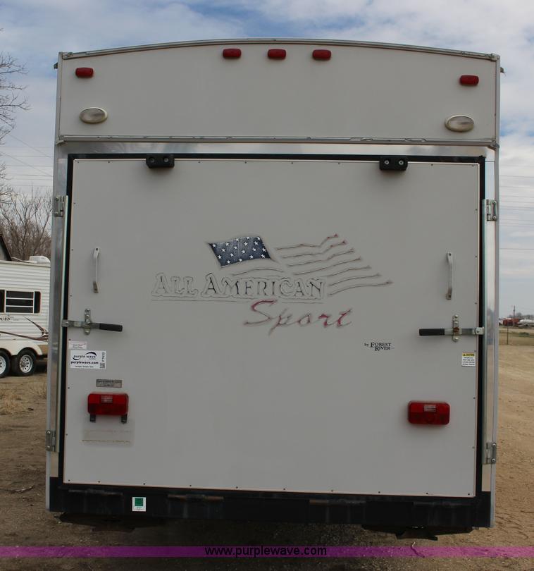 image for item F7633 2005 All American Sport fifth wheel toy hauler camper