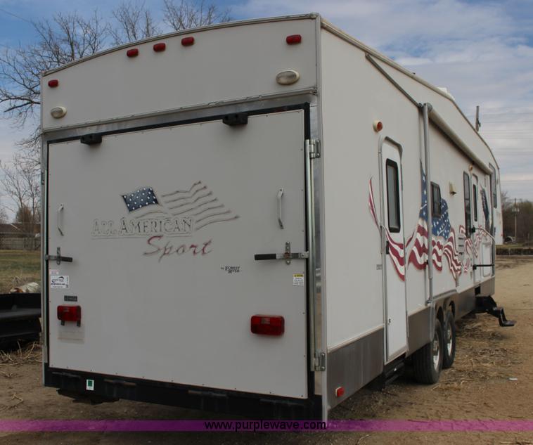 image for item F7633 2005 All American Sport fifth wheel toy hauler camper