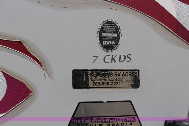 image for item F7633 2005 All American Sport fifth wheel toy hauler camper