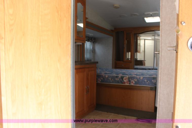 image for item F7633 2005 All American Sport fifth wheel toy hauler camper