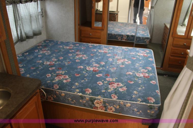 image for item F7633 2005 All American Sport fifth wheel toy hauler camper