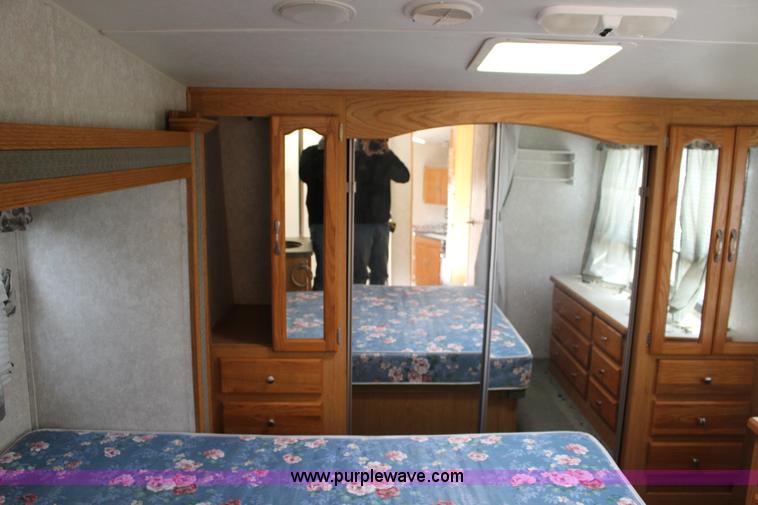 image for item F7633 2005 All American Sport fifth wheel toy hauler camper