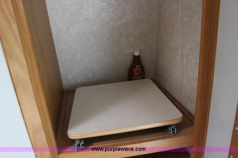 image for item F7633 2005 All American Sport fifth wheel toy hauler camper