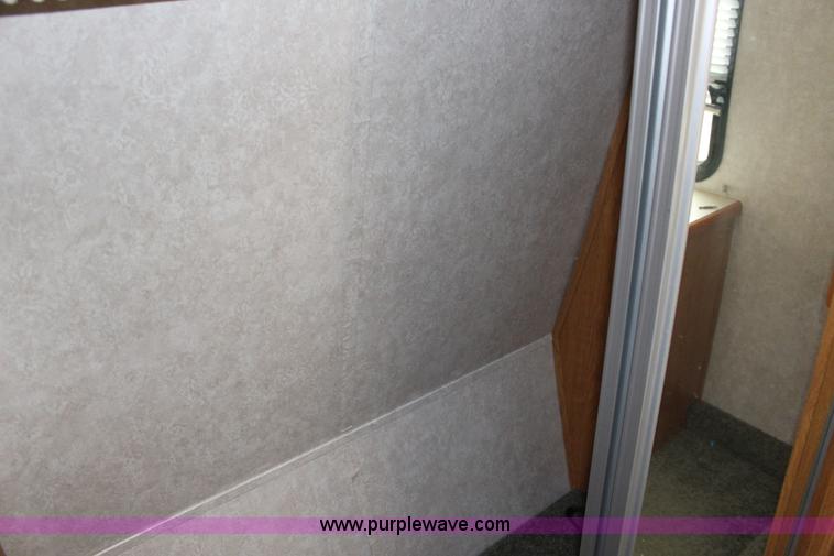 image for item F7633 2005 All American Sport fifth wheel toy hauler camper