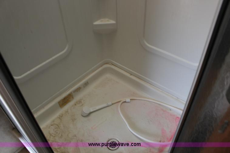 image for item F7633 2005 All American Sport fifth wheel toy hauler camper