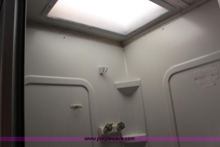 image for item F7633 2005 All American Sport fifth wheel toy hauler camper