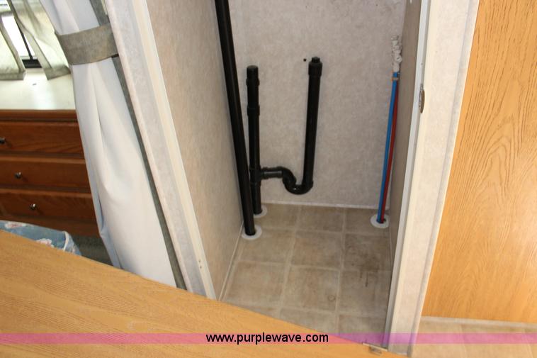 image for item F7633 2005 All American Sport fifth wheel toy hauler camper