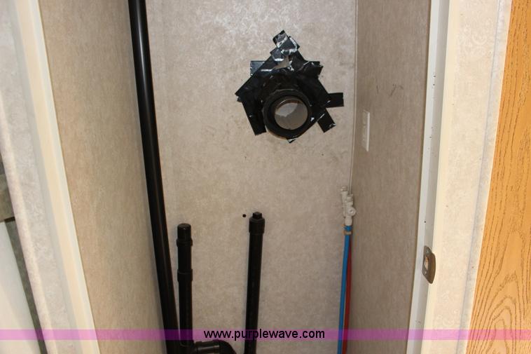 image for item F7633 2005 All American Sport fifth wheel toy hauler camper