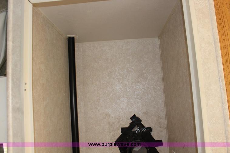 image for item F7633 2005 All American Sport fifth wheel toy hauler camper