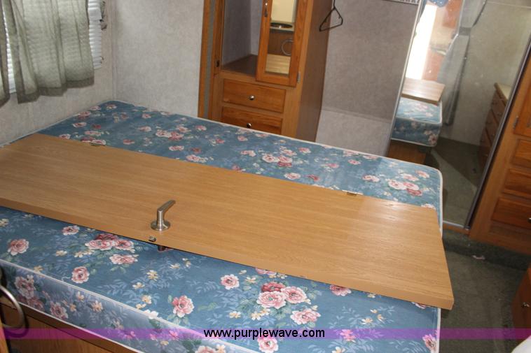 image for item F7633 2005 All American Sport fifth wheel toy hauler camper