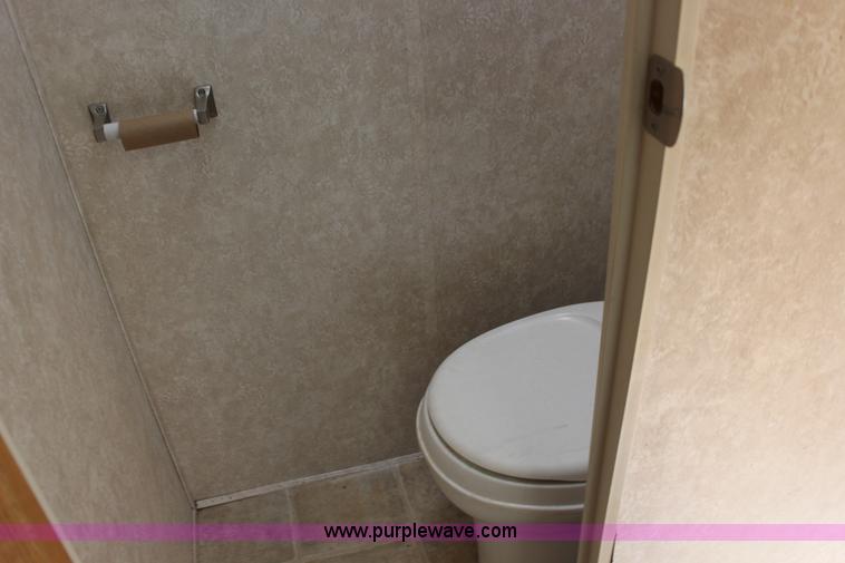 image for item F7633 2005 All American Sport fifth wheel toy hauler camper