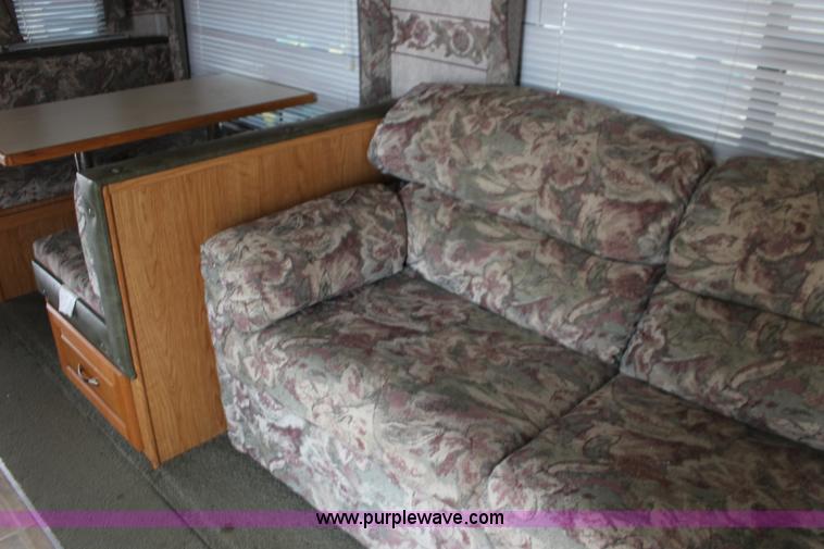 image for item F7633 2005 All American Sport fifth wheel toy hauler camper