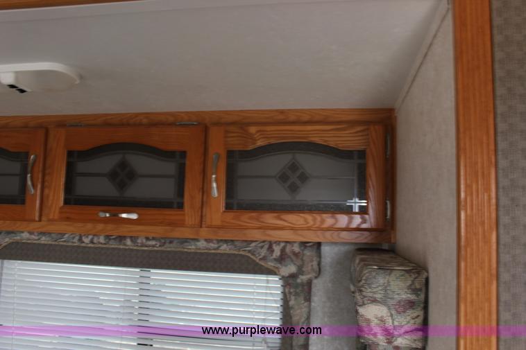 image for item F7633 2005 All American Sport fifth wheel toy hauler camper