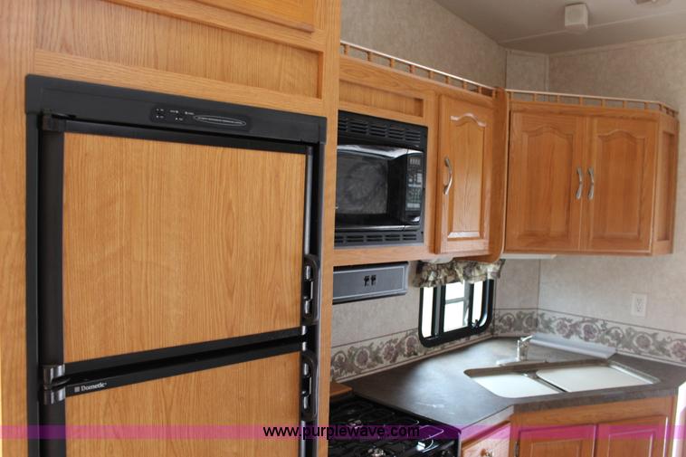 image for item F7633 2005 All American Sport fifth wheel toy hauler camper