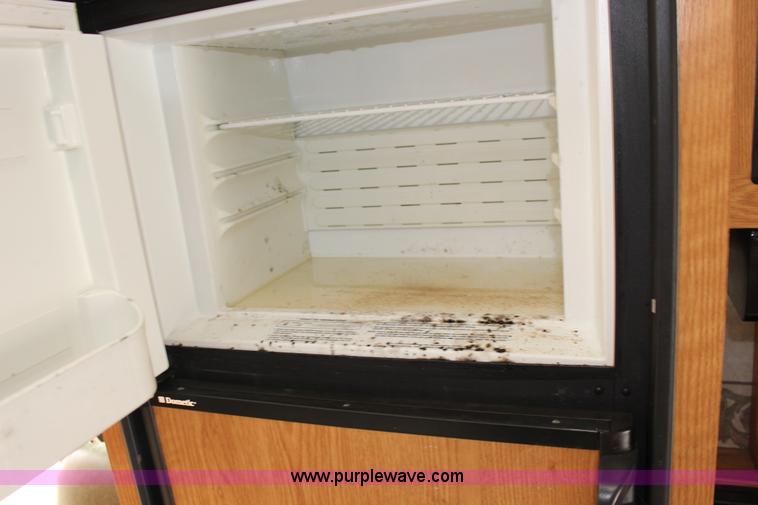 image for item F7633 2005 All American Sport fifth wheel toy hauler camper