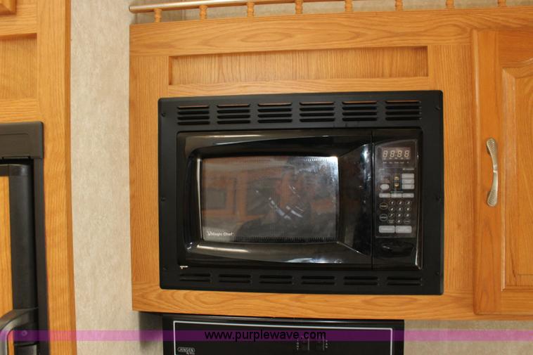 image for item F7633 2005 All American Sport fifth wheel toy hauler camper