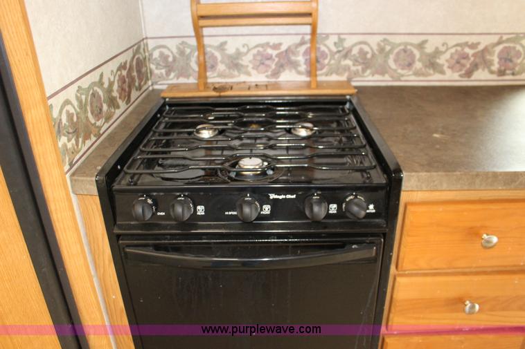 image for item F7633 2005 All American Sport fifth wheel toy hauler camper