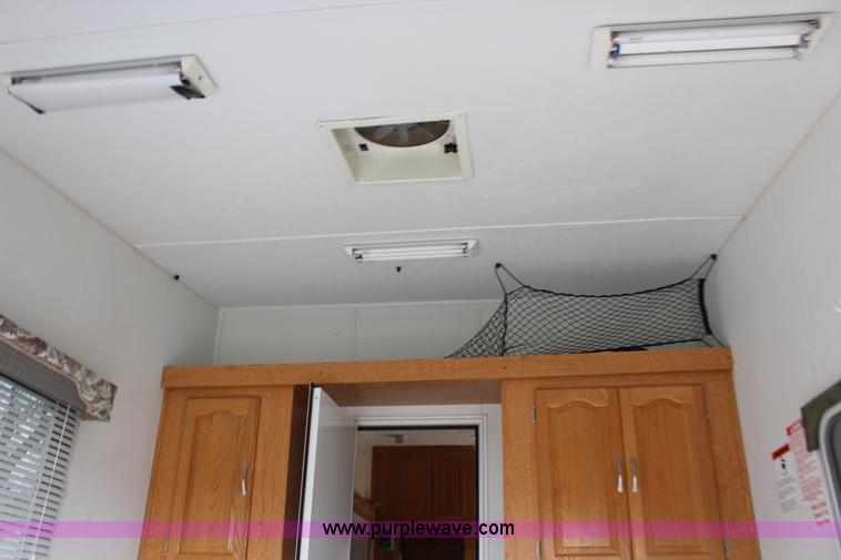 image for item F7633 2005 All American Sport fifth wheel toy hauler camper