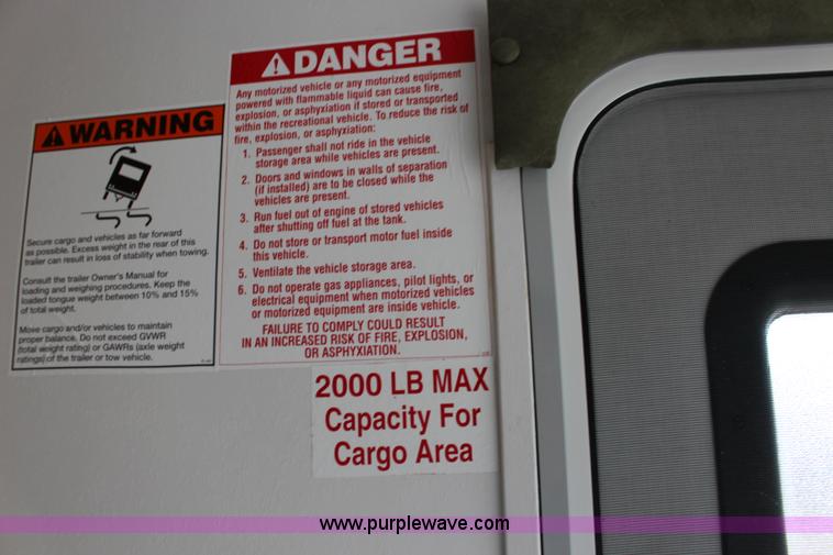 image for item F7633 2005 All American Sport fifth wheel toy hauler camper